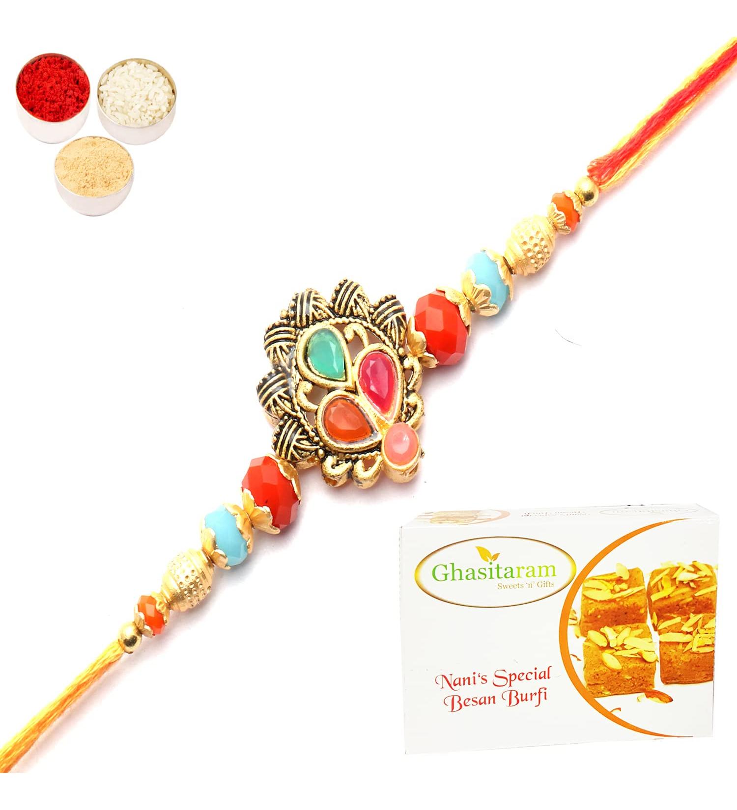 Ghasitaram Gifts Rakhi for Brother Rakhis Online - The Beautiful Colours of Our Lives Rakhi with 400 GMS of Besan Barfi Rakhi Set with 400 gms of Besan Barfi - Buy Online on SooperMarket.com