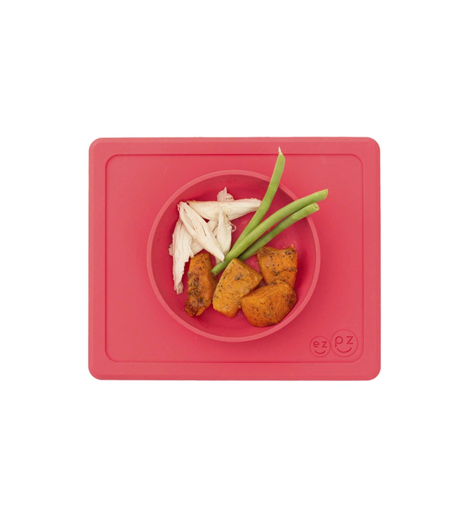 ezpz Mini Bowl (Coral) - Silicone Suction Bowl for Infants + Toddlers with Built-in Placemat - Includes Travel Bag - Buy Online on SooperMarket.com