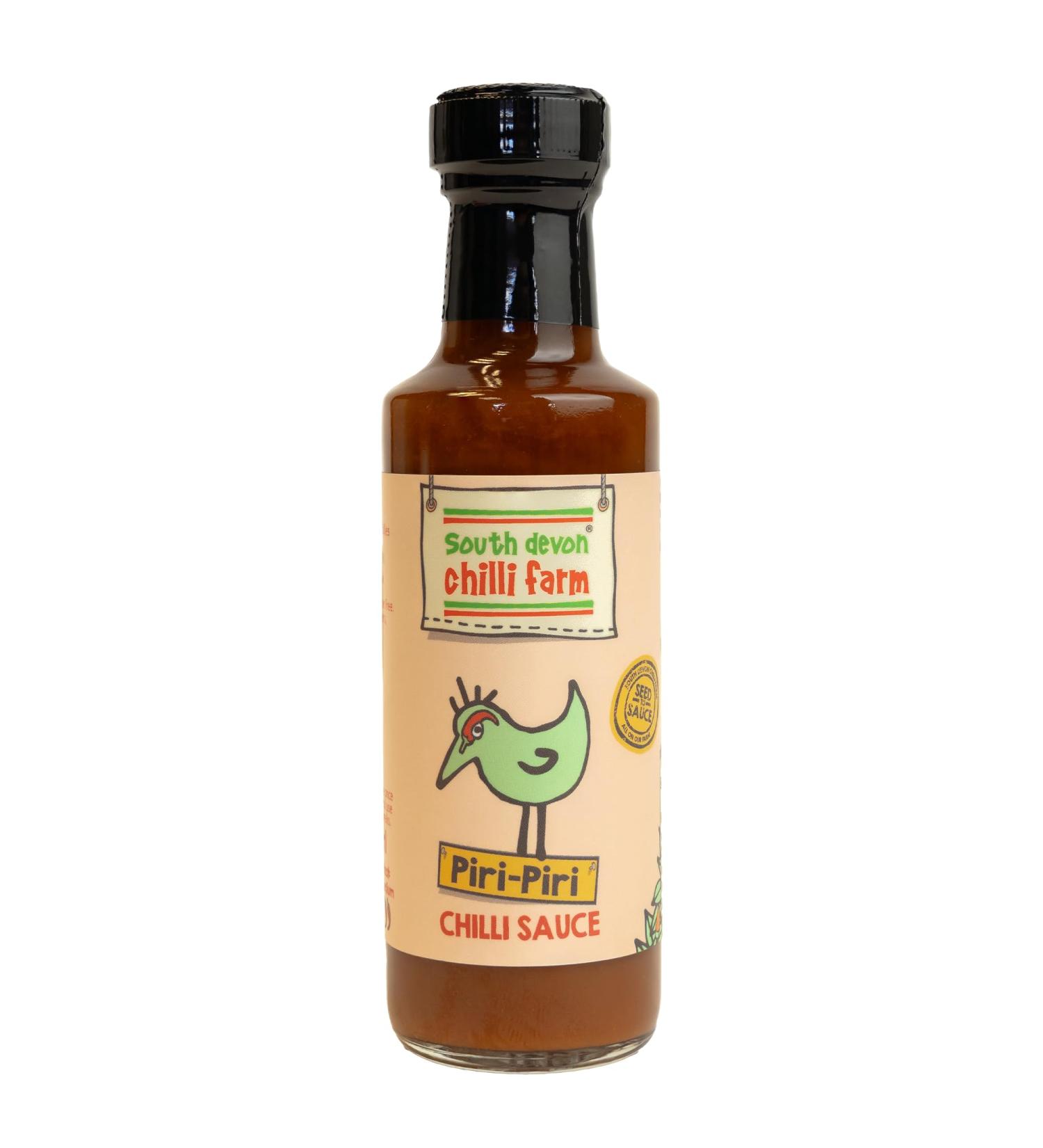 South Devon Chilli Farm Piri Piri Sauce | Made from Fresh Red Chillies- An Irresistible and Addictive Classic Lemony and Salty Savoury Sauce Heat Rating: 3/10-100ml Bottle - Buy Online on SooperMarket.com