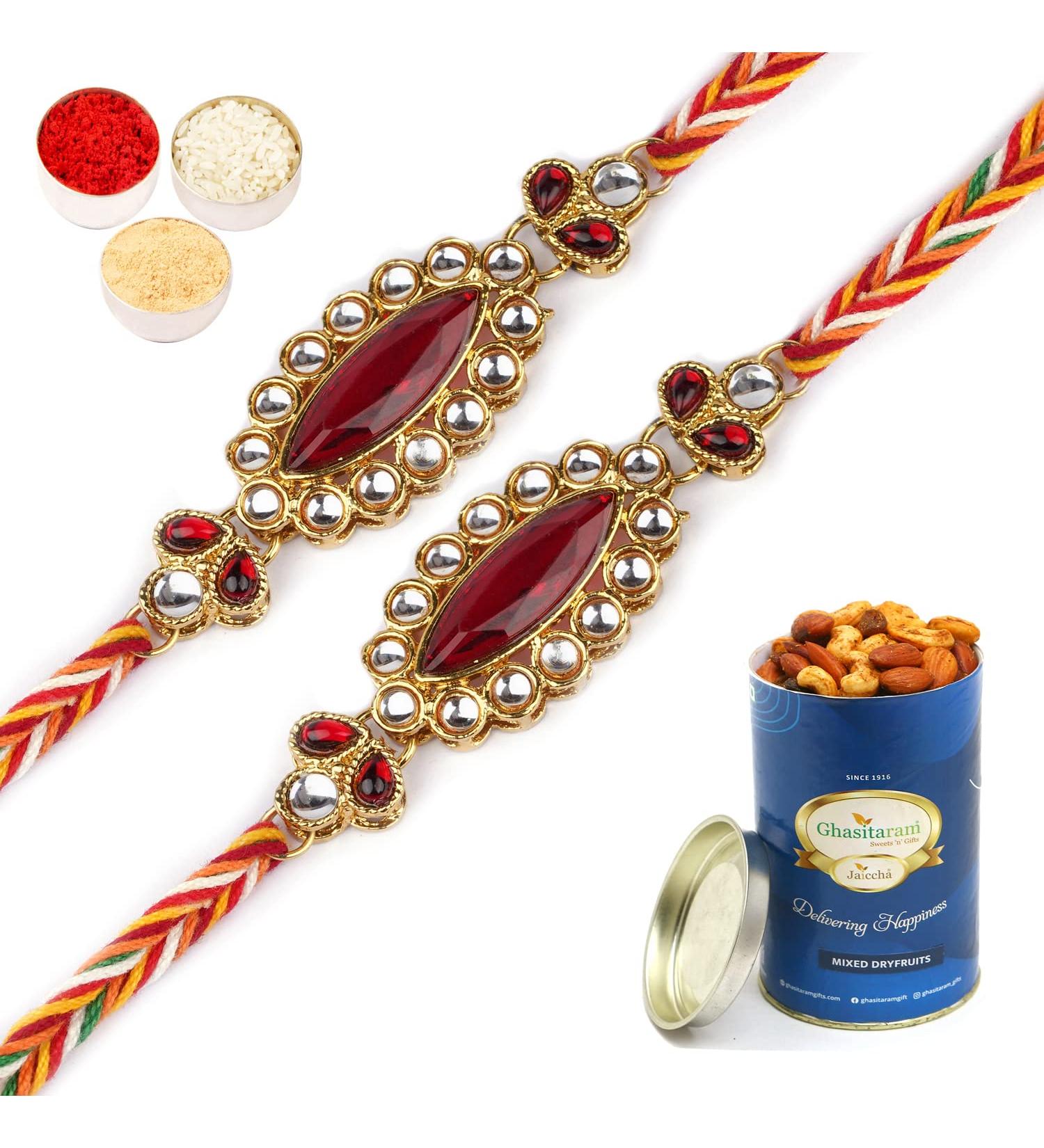 Ghasitaram Gifts Rakhis Online Set of Two J-3756 Big Oval Jewel Rakhiwith 100 GMS of Dryfruits Mix Can 2 Rakhi with 100 gms of Dryfruits Mix Can - Buy Online on SooperMarket.com