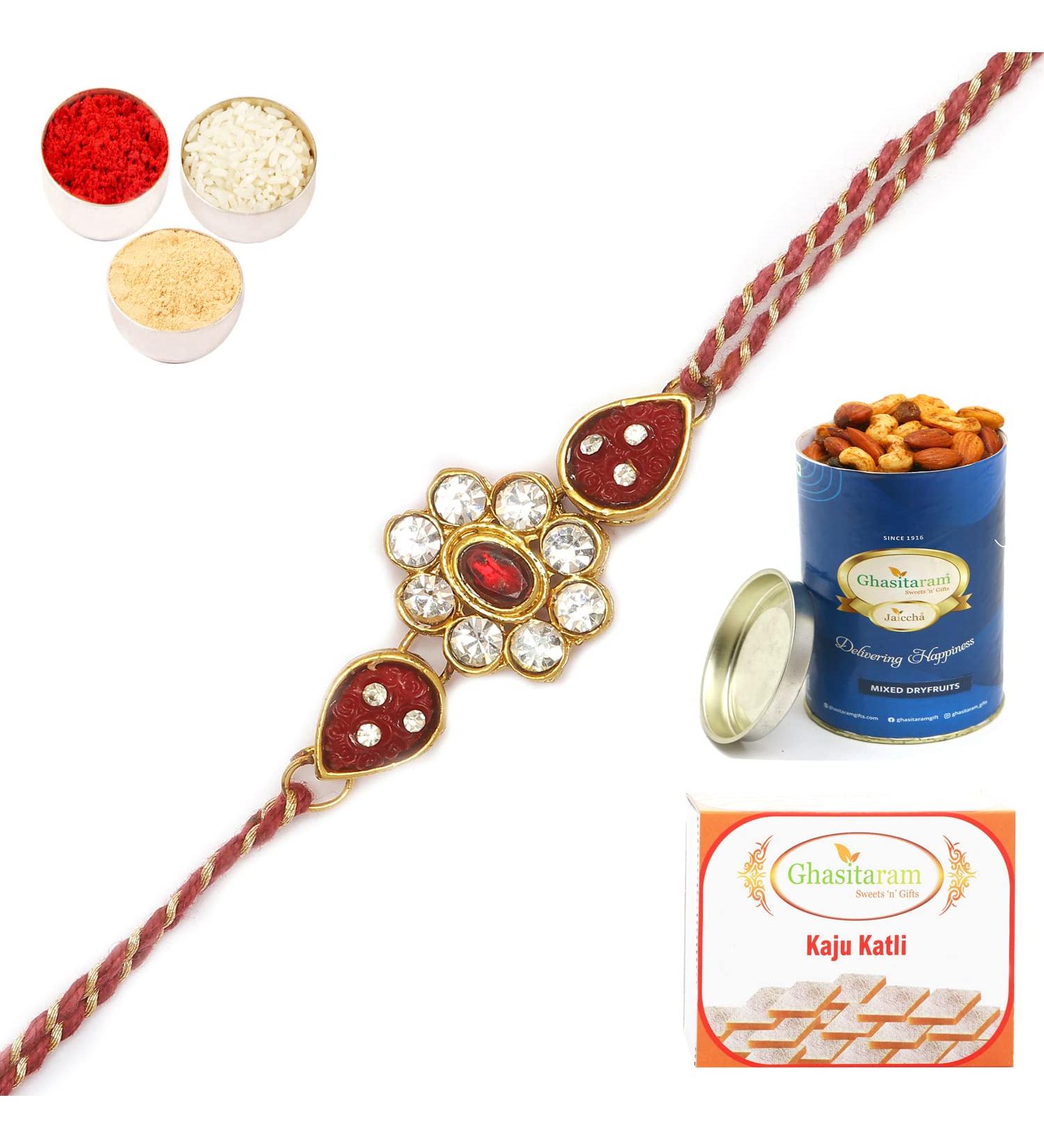 Ghasitaram Gifts Rakhis Online - J-31062 Rose Flower Jewel Rakhiwith 100 GMS of Dryfruits Mix Can 200 GMS of Kaju katli Rakhi & 100g Dryfruits Mix Can 200g Kaju katli - Buy Online on SooperMarket.com