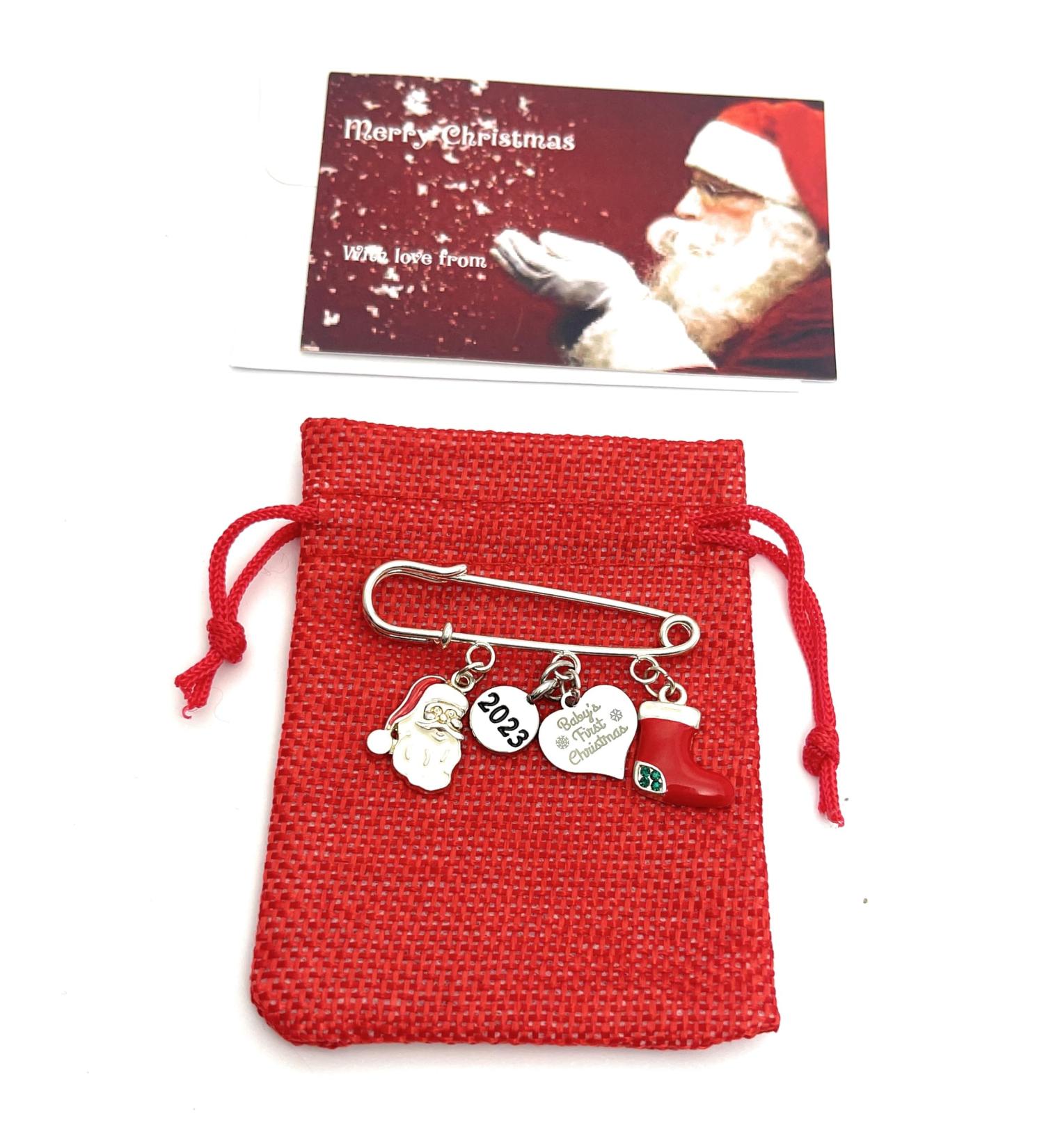 2023 Baby's First Christmas Keepsake Brooch with Santa and Stocking Charms in Velvet Gift Bag - Buy Online on SooperMarket.com