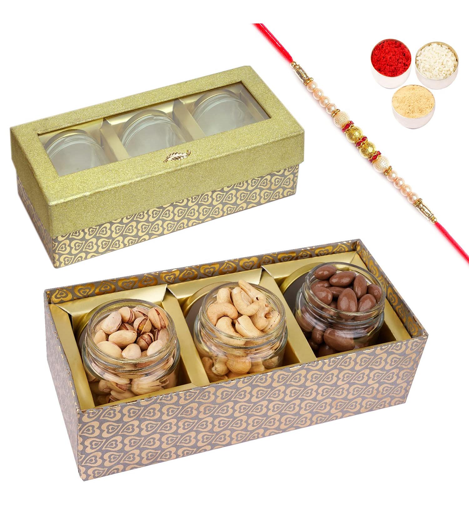 Jaiccha Ghasitaram Rakhi Gifts for Brothers Box with 3 Jars of Chocolate Coated Almonds Roasted Cashews and Pistachios with Pearl Rakhi Box of 3 Jars & Choco Almonds Kaju Pista & Rakhi - Buy Online on SooperMarket.com