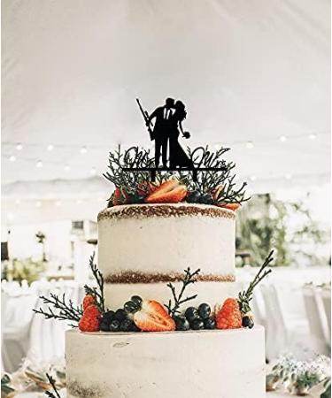 Mr and Mrs Wedding Cake Topper - Groom & Bride With Heavy Gun and Holding Flowers - Funny Gun Theme Wedding/Anniversary/Bridal Shower Cake Topper Funny Wedding Cake Topper (Heavy Gun) - Buy Online on SooperMarket.com