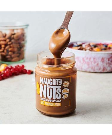 Naughty Nuts Bio Mandelmus Smooth - 100% Vegan Almond Butter 500g | No Palm Oil No Sugar | Healthy Topping & Recipe Ingredient - Buy Online on SooperMarket.com