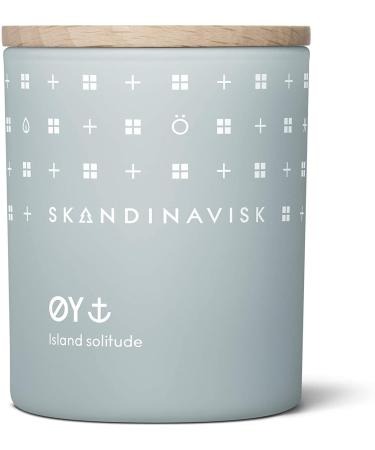 Skandinavisk Y 'Island' mini scented candle. Fragrance notes: crabapple and dog rose water moss and green leaves. 65 g. y 'Island' 65g