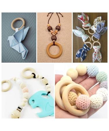 Organic Wooden Teething Rings - Set of 10 Smooth Teething Toys | 7cm & 5cm Diameter | Safe & Natural Baby Comfort - Buy Online on SooperMarket.com