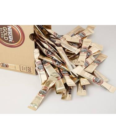 NESCAF Gold Blend Coffee Sachets Individually Wrapped x 30 x 1.8g Sticks - Bundle with Refillable Silver Window Lid Tin and Latte Spoon for Home Travel or Desk - Buy Online on SooperMarket.com