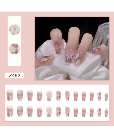 WOOXDYUK Nail Art Set - 24 Medium French Tip Press On Nails with Crystal Butterflies Imported Jelly Glue + Nail Rub & Remover for Perfect Nail Designs - Buy Online on SooperMarket.com