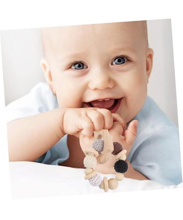 KOMBIUDA Silicone & Wooden Baby Teether Maracas | Musical Instruments & Teething Toy for Babies 0-6 Months - Buy Online on SooperMarket.com