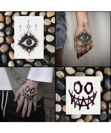 Oottati Waterproof Halloween Temporary Tattoo Stickers - 9 Sheets Black Skull Eye Devil Sun Moon Totem - Buy Online on SooperMarket.com