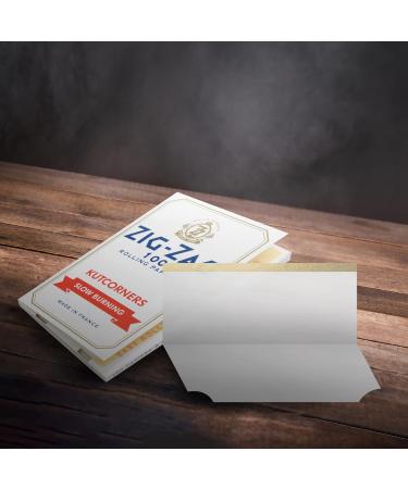Zig-Zag - Slow Burning Rolling Papers Carton of 25 packs 100 Leafs per Pack Size Single Wide (Regular) (2 Sizes) Available Kut Corners Easy Rolling 100% Natural Gum Arabic No Bleach Authentic (White) - Buy Online on SooperMarket.com