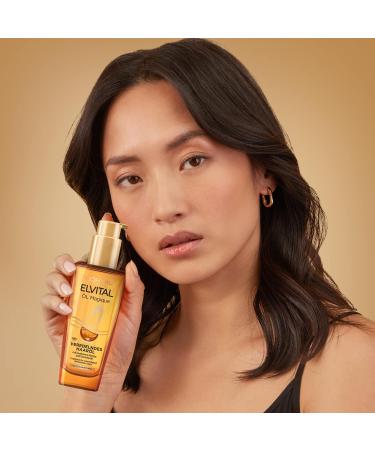 L'Or al Paris Elvital Magic Oil 100ml - Nourishing Hair Oil for Soft Shiny Hair Frizz Control & Heat Protection up to 230 C with 6 Precious Flower Oils - Buy Online on SooperMarket.com