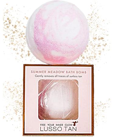 Luxury Tan Remover Bath Bomb Lusso Tan. Organic Vegan and Cruelty-Free Self-Tan Eraser with Natural Essential Oils. Paraben Free. Fast-Action Fake Tan Remover. Summer Meadow Fragrance.