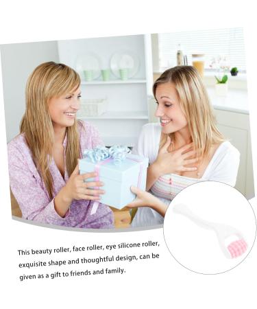 Silicone Face Roller - Beauty Tool for Firming & Massaging | Portable Pink Facial Massager | International Shipping - Buy Online on SooperMarket.com