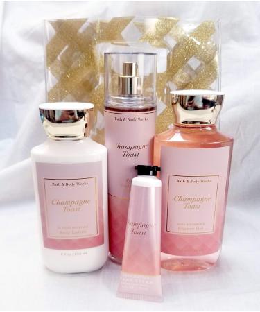 Bath and Body Works - Champagne Toast Body Care - Full Size 4 Piece Gift set + Random Gift Bag (Includes Fragrance Mist  Shower Gel  Lotion  and Hand Cream)