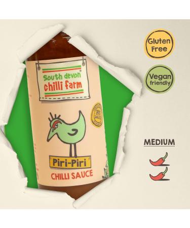 South Devon Chilli Farm Piri Piri Sauce | Made from Fresh Red Chillies- An Irresistible and Addictive Classic Lemony and Salty Savoury Sauce Heat Rating: 3/10-100ml Bottle - Buy Online on SooperMarket.com