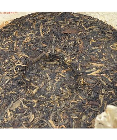 Pu-erh tea 2006 Xishuangbanna Yiwu Organic Green Cake 400g Raw - Buy Online on SooperMarket.com