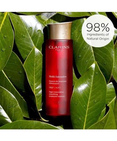 CLARINS Super Restorative Treatment Essence - Anti-Aging Face Lotion for Mature Skin | Smooths Pores Softens Skin & Restores Radiance | 6.7 Fl Oz - International Shipping Available - Buy Online on SooperMarket.com
