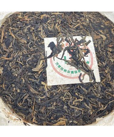 Pu-erh tea 2006 Xishuangbanna Yiwu Organic Green Cake 400g Raw - Buy Online on SooperMarket.com