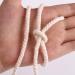 XKDOUS 4mm x 150Yards Natural Cotton Macrame Cord - 3 Strand Twisted Rope for Wall Hanging, Plant Hangers, Crafts & Knitting - Soft Undyed Cotton Rope for Decorative Projects - Buy Online on SooperMarket.com