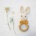 Buy Organic Baby Wooden Teether Crochet Bunny Rattle Pacifier Bracelet - Ideal for Teething Toddlers | International Shipping Available - Buy Online on SooperMarket.com