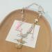 Shop Oralgo's Stylish Pearl Necklace with Art Beads & Adjustable Loop Pendant - Perfect Collarbone Chain for Every Occasion - Buy Online on SooperMarket.com