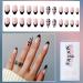 Justotry 24 Pcs Almond Short False Nails - Heart Black French Press On Nails | Trendy Fake Nails with Nail Glue | Oval Medium Stick On Nails for Women | Nail Art Design - Buy Online on SooperMarket.com