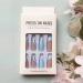 Blue Almond Shape Press on Nails with Wave Designs | Medium Length French False Nails for Women - Buy Online on SooperMarket.com