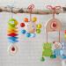 HABA 305230 Han Parrot Figure | Baby Toys for Seats Cots & Strollers | Wooden Toys with Bells for 6+ Months - Buy Online on SooperMarket.com