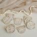 Ginger Ray 13 Baby Milky Milk Gondes made of teddy bear and 1 baby party gift "Hello World" sign neutral milestone signs